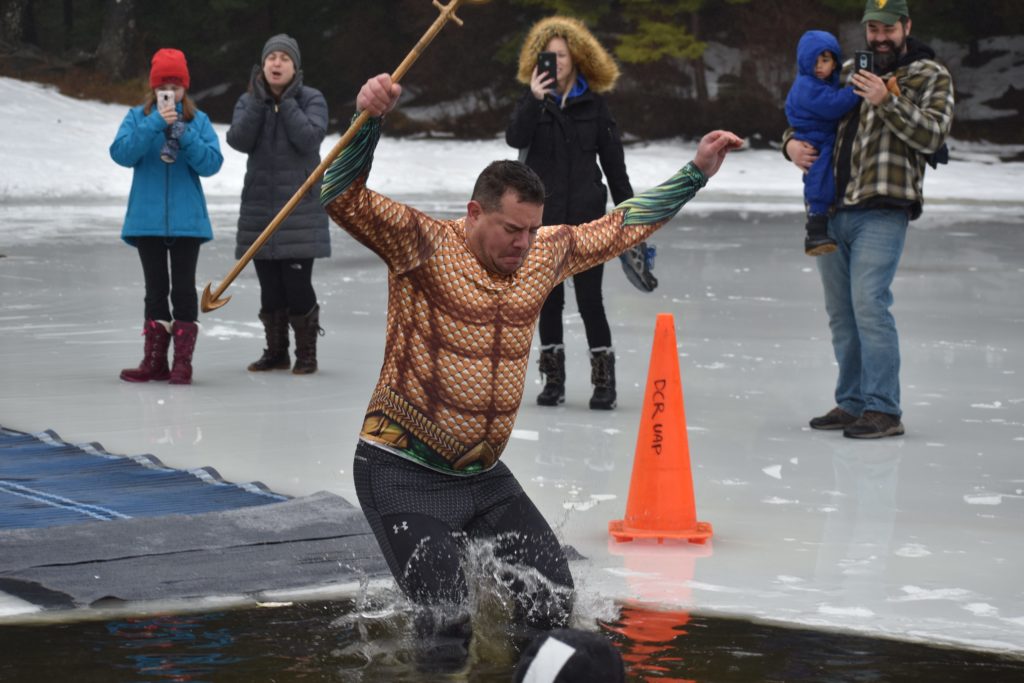 Man dressed as Aquaman jumps into lake