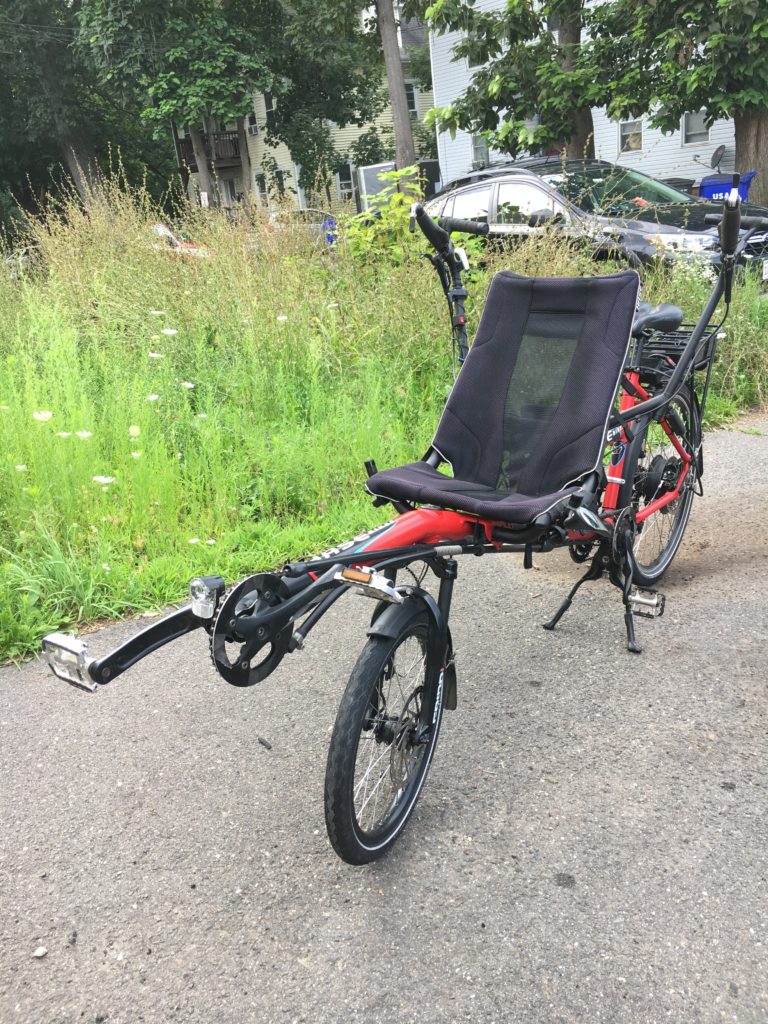 Front view of the bike showing the recumbent front seat with back support
